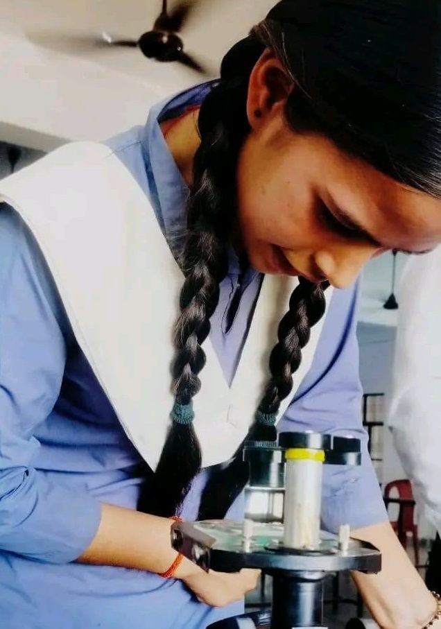 Teacher explaining physics concept