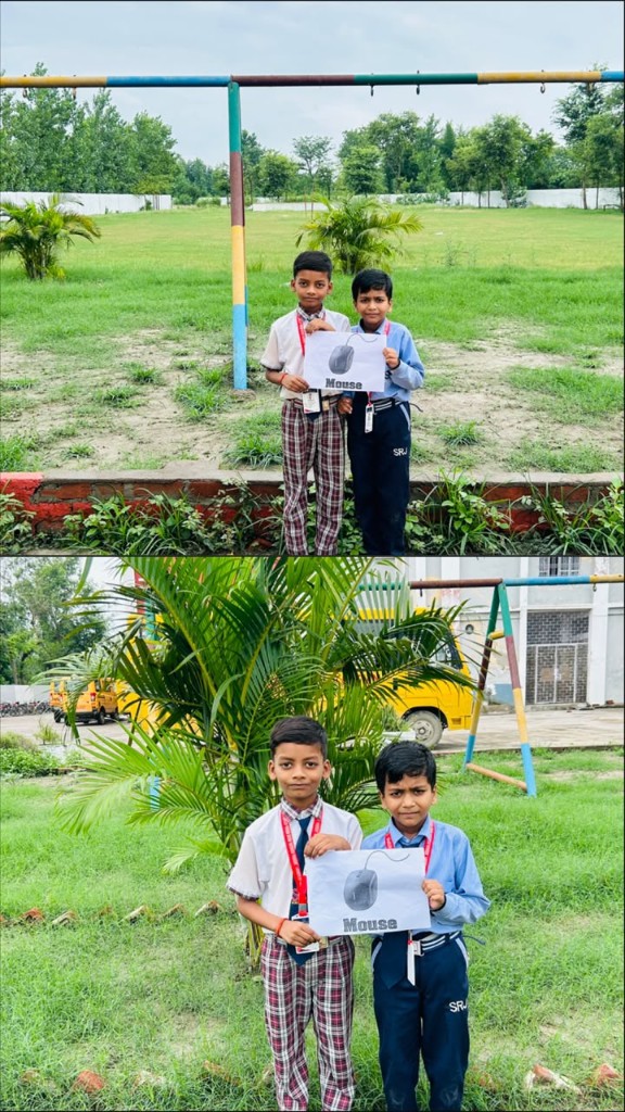 SRJ Academy students holding Mouse computer basics activity card