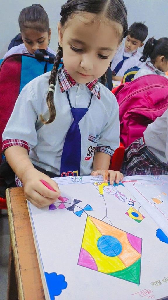 SRJ Academy girl colouring with school logo uniform