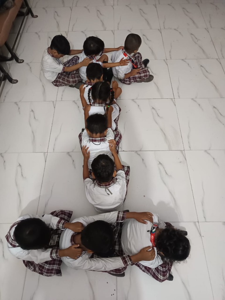 SRJ Academy students forming number 1